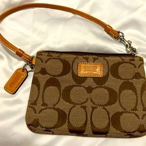Signature Coach canvas wristlet with key fob